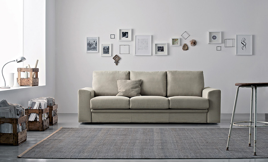 Decorare le pareti del soggiorno con foto e quadri: 10 idee.