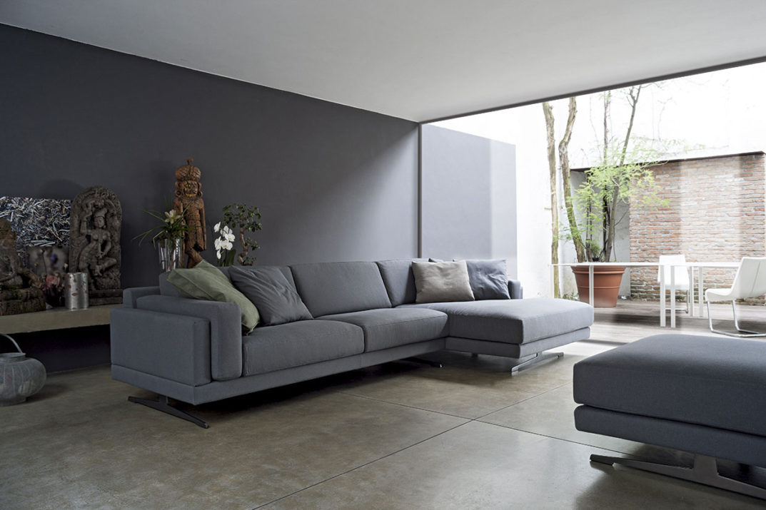 Arredare il soggiorno con il grigio salotto perfetto for Tendenze arredamento soggiorno
